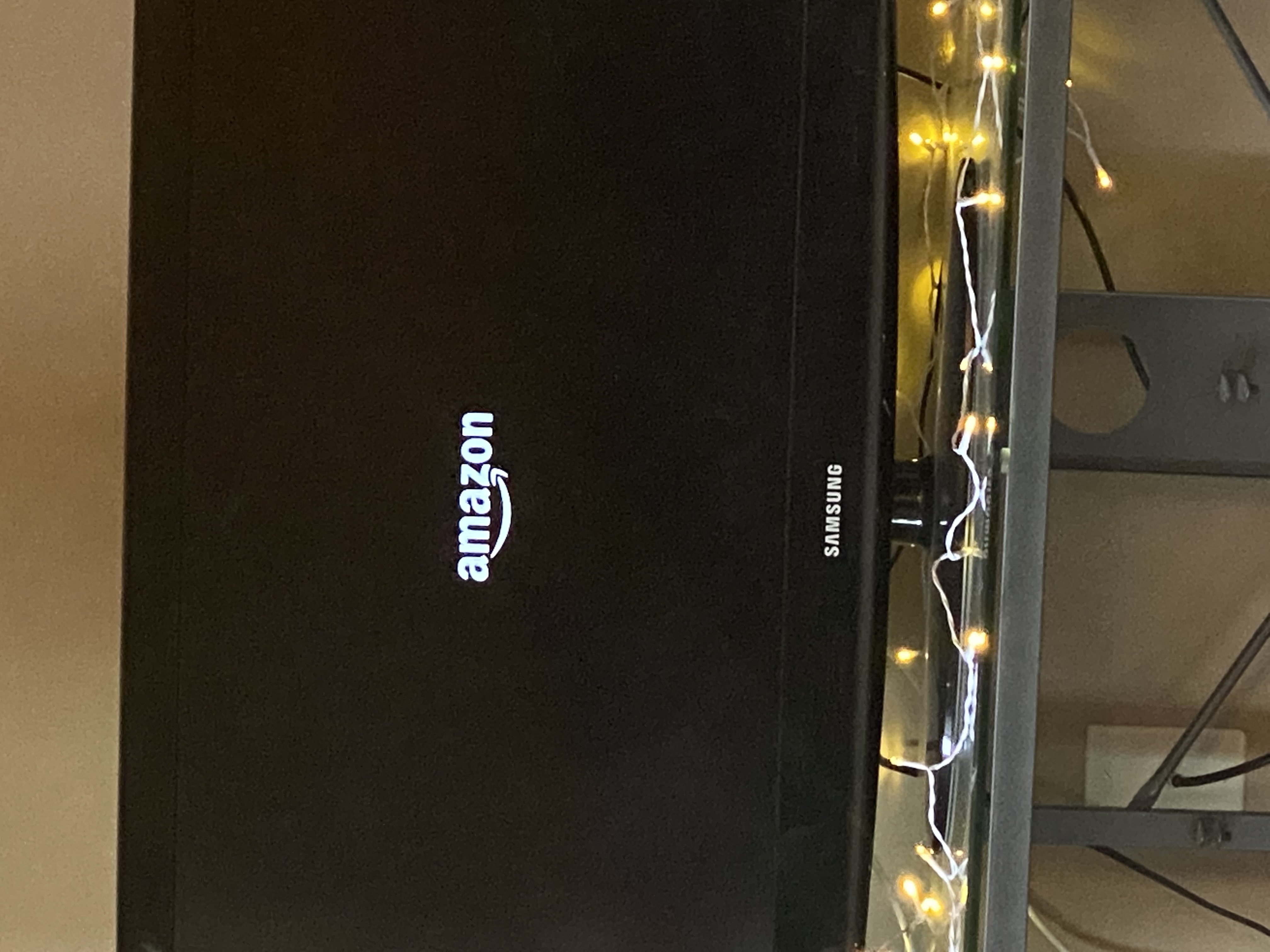 Why is my Fire TV Stick stuck on the Amazon logo screen?