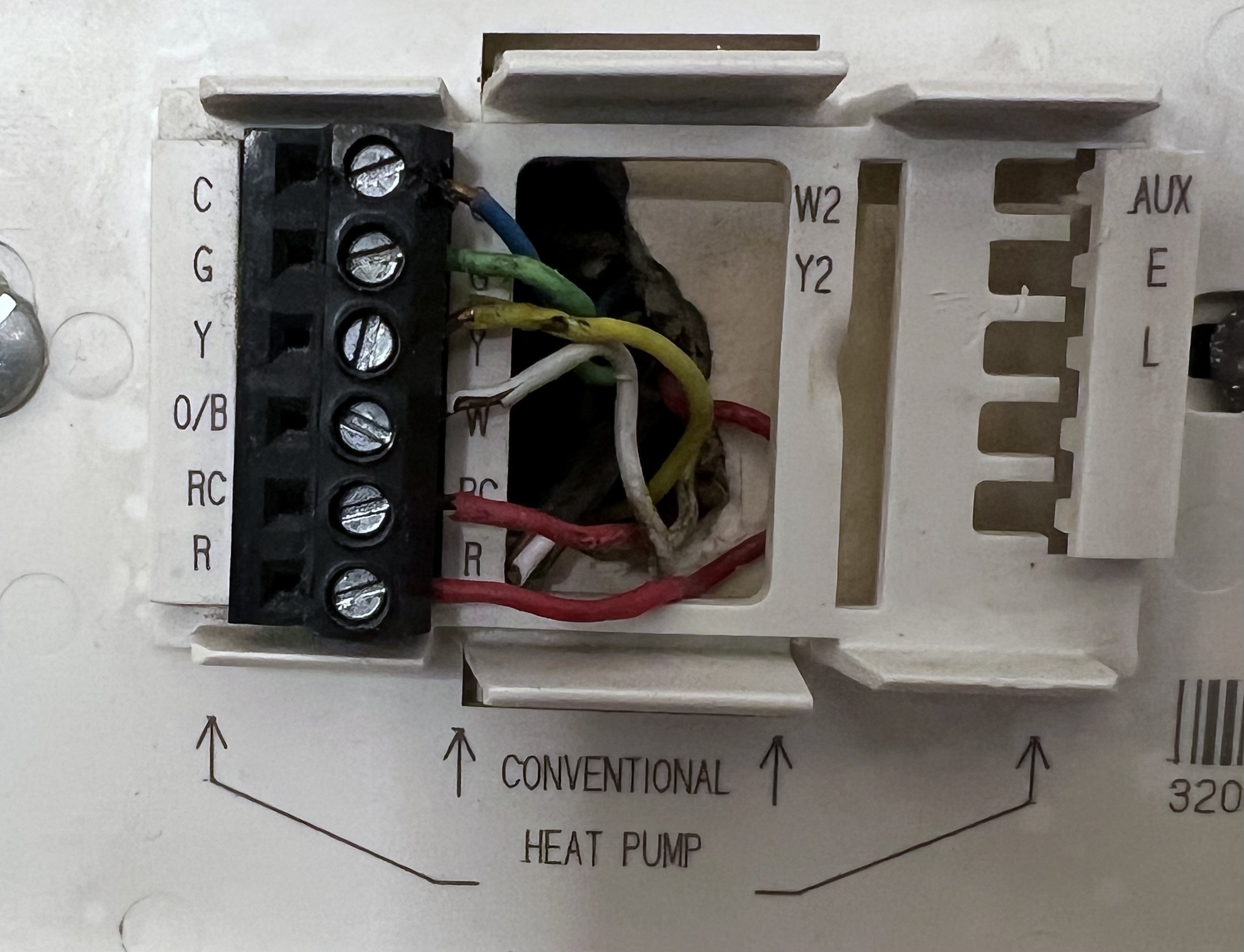 Why is my AC running when in heat mode